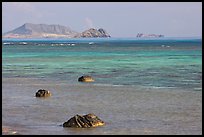 Rocks and turquoise waters near Makai research pier. Oahu island, Hawaii, USA (color)