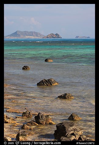 Rocks and turquoise waters near Makai research pier. Oahu island, Hawaii, USA