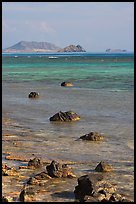 Rocks and turquoise waters near Makai research pier. Oahu island, Hawaii, USA (color)