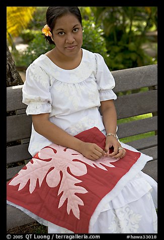 Woman making a traditional hawaiian quilt. Polynesian Cultural Center, Oahu island, Hawaii, USA