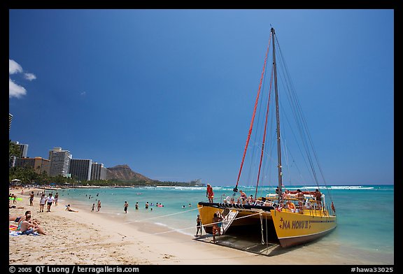 Catamaran and Waikiki Beach. Waikiki, Honolulu, Oahu island, Hawaii, USA