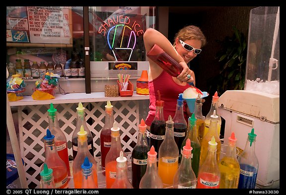 Woman preparing a cup of shave ice. Waikiki, Honolulu, Oahu island, Hawaii, USA (color)