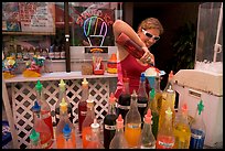 Woman preparing a cup of shave ice. Waikiki, Honolulu, Oahu island, Hawaii, USA