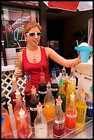 Woman handing out a cup of shave ice. Waikiki, Honolulu, Oahu island, Hawaii, USA