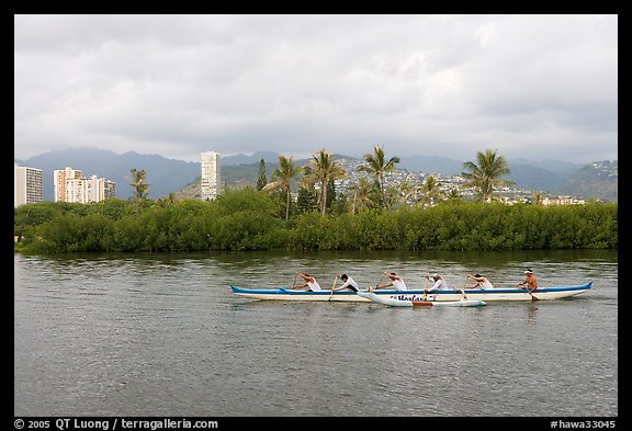 Outrigger canoe along the Ala Wai Canal. Waikiki, Honolulu, Oahu island, Hawaii, USA (color)