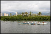Outrigger canoe along the Ala Wai Canal. Waikiki, Honolulu, Oahu island, Hawaii, USA