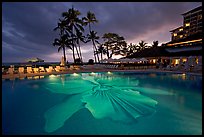 Swimming pool at sunset, Halekulani hotel. Waikiki, Honolulu, Oahu island, Hawaii, USA (color)