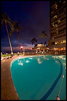Swimming pool at night, with dance performance, Sheraton hotel. Waikiki, Honolulu, Oahu island, Hawaii, USA ( color)