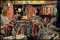 Woman shopping hawaiian dresses. Waikiki, Honolulu, Oahu island, Hawaii, USA