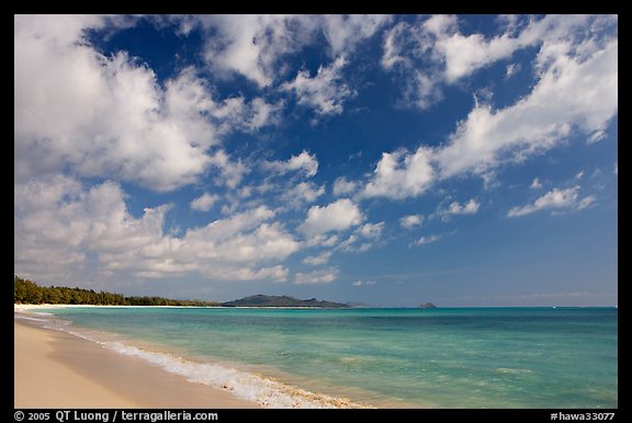Waimanalo Beach and ocean with turquoise waters and clouds. Oahu island, Hawaii, USA