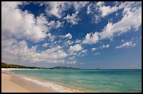 Waimanalo Beach and ocean with turquoise waters and clouds. Oahu island, Hawaii, USA