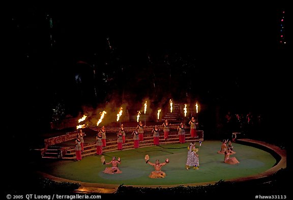 Wedding procession led by torch bearers performed by Tahitian dancers. Polynesian Cultural Center, Oahu island, Hawaii, USA (color)