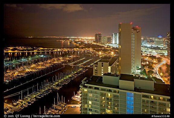 Ala Wai Yatch Harbor and skyline at night. Waikiki, Honolulu, Oahu island, Hawaii, USA