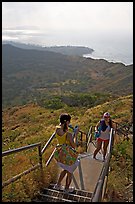 Tourists take a photo on the last steps of the Diamond Head crater summit trail. Oahu island, Hawaii, USA (color)