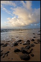 Boulders, beach and clouds, Lydgate Park, sunrise. Kauai island, Hawaii, USA (color)