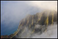 Fluted ridges seen through clouds, Kalalau lookout, late afternoon. Kauai island, Hawaii, USA ( color)