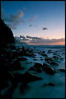 Boulders and misty surf from Kee Beach, dusk. Kauai island, Hawaii, USA (color)