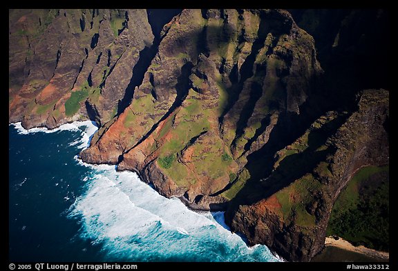 Aerial view of fluted mountains and surf, Na Pali Coast. Kauai island, Hawaii, USA