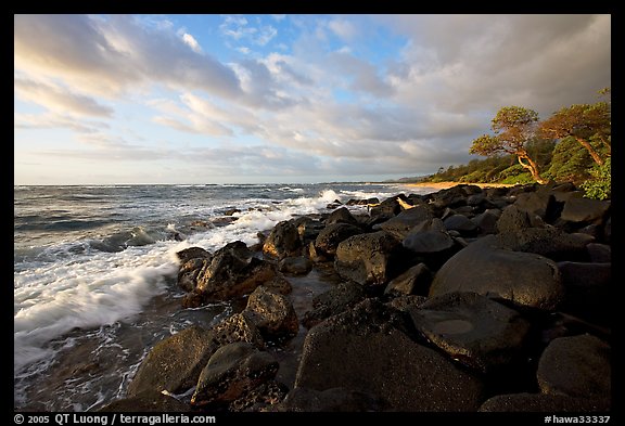 Boulders and coastline, Lydgate Park, sunrise. Kauai island, Hawaii, USA