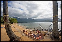 Family on Hammock with Hanalei Bay in the background. Kauai island, Hawaii, USA