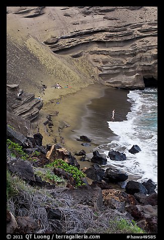 Beachgoers and green sand beach near South Point. Big Island, Hawaii, USA (color)