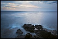 Fishing rods at sunset, Ka Lea (South Point). Big Island, Hawaii, USA (color)
