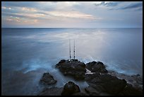 Fishing rods at sunset, Ka Lea (South Point). Big Island, Hawaii, USA