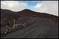Unpaved road and volcanic landscape. Mauna Kea, Big Island, Hawaii, USA