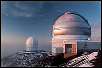 Recent snow and telescopes at sunset. Mauna Kea, Big Island, Hawaii, USA (color)