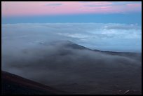 Sea of clouds and earth shadow. Mauna Kea, Big Island, Hawaii, USA