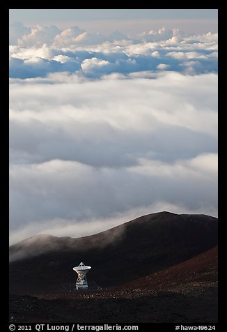 Astronomic radio antenna and sea of clouds. Mauna Kea, Big Island, Hawaii, USA
