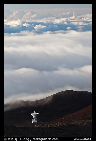 Astronomic radio antenna and sea of clouds. Mauna Kea, Big Island, Hawaii, USA (color)