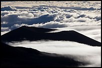 Dark ridges and clouds from above. Mauna Kea, Big Island, Hawaii, USA