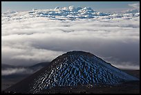 Dark cinder cone and sea of clouds. Mauna Kea, Big Island, Hawaii, USA ( color)