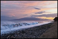 Lanai Island and crashing surf at sunset. Lahaina, Maui, Hawaii, USA