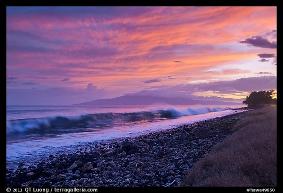 Crashing wave, Lanai Island, and colorful sunset clouds. Lahaina, Maui, Hawaii, USA (color)