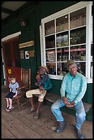 Boy looking at quirky sculptures, Ulupalakua. Maui, Hawaii, USA ( color)