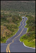 Car on winding Pilani Highway. Maui, Hawaii, USA