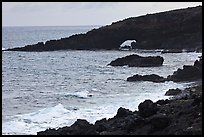 Dark coastline with sea tunnel. Maui, Hawaii, USA ( color)