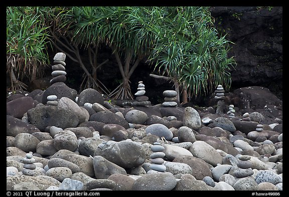 Rock piles on Hanakapiai Beach. Kauai island, Hawaii, USA