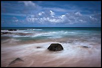 Volcanic rock and wave motion. Kauai island, Hawaii, USA (color)