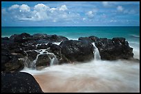 Balsalt and surf motion. Kauai island, Hawaii, USA (color)