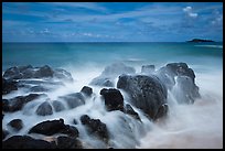 Rock with water motion and Mokuaeae island. Kauai island, Hawaii, USA (color)