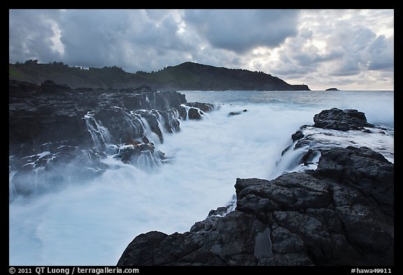 Trench carved by surf in lava bench, Mokolea Peninsula. Kauai island, Hawaii, USA