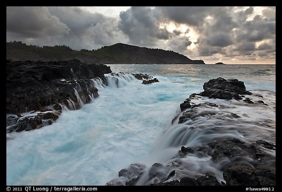 Lava bench gorge and surf at sunset, Mokolea Peninsula. Kauai island, Hawaii, USA (color)