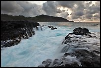 Lava bench gorge and surf at sunset, Mokolea Peninsula. Kauai island, Hawaii, USA ( color)