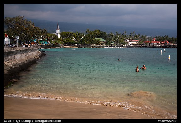 Beach, seawall and town, Kailua-Kona. Hawaii, USA (color)