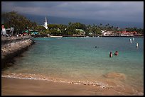 Beach, seawall and town, Kailua-Kona. Hawaii, USA (color)