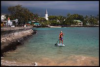 Paddlesurfer and Kailua-Kona. Hawaii, USA (color)