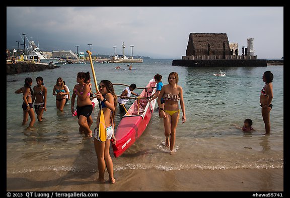 Girls and outrigger canoe, Kailua-Kona. Hawaii, USA (color)